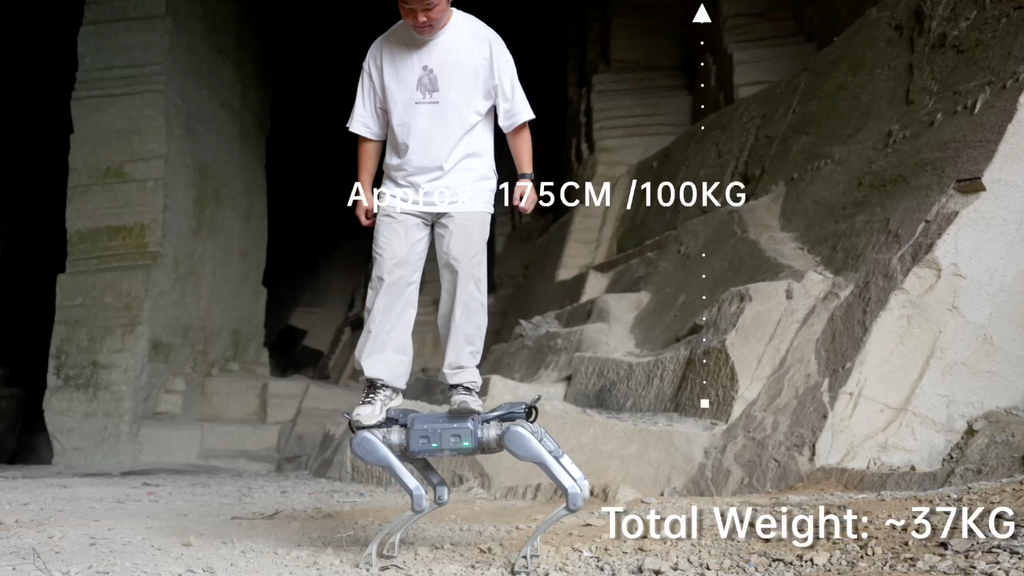 Person standing on a robot with text indicating height, weight, and total weight.