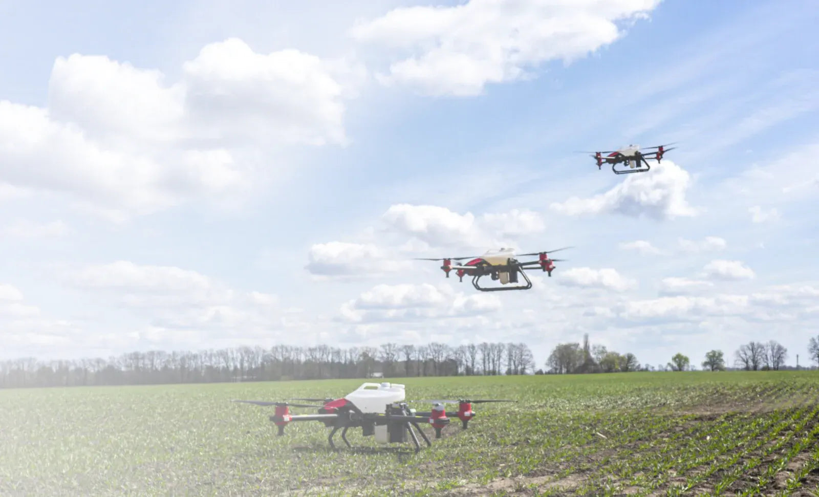 XAG agricultural drones flying above a crop field for precision agriculture